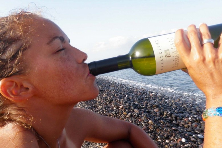 Derika sippin' vino on the beach!